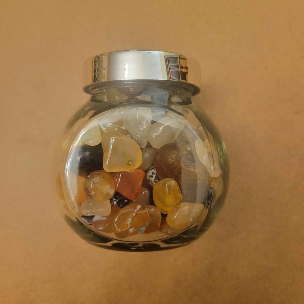 Decorative Jar Filled With Polished Oregon Agates And Other Beach Stones